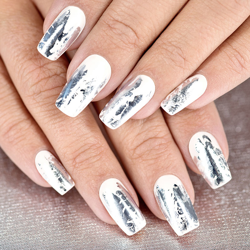 stylish trendy female silver manicure